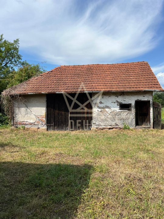 Casa cu teren mare si acte la zi !