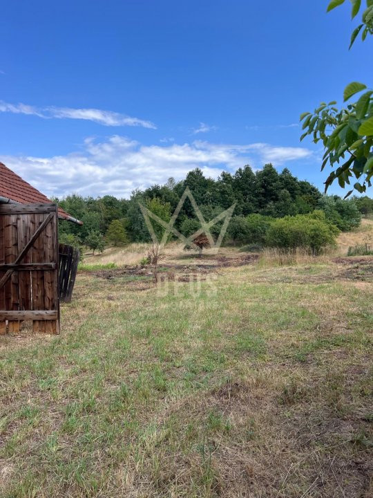 Casa cu teren mare si acte la zi !